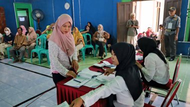 Voting and counting process in the election, Pekalongan Indonesia, November 11 2024 clipart