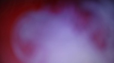 Bulanık bokeh ışığı ve enerji dokusuyla parlak kırmızı soyut hareket arkaplanı