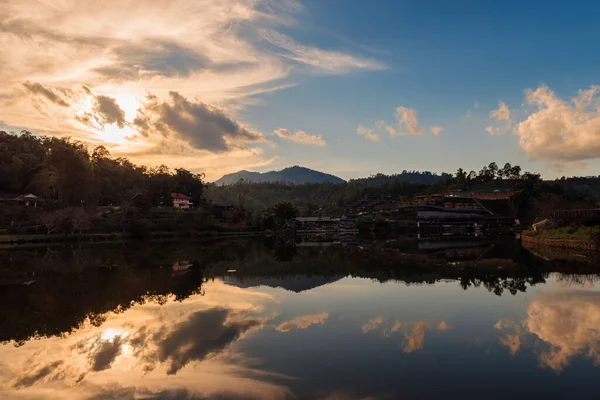 stock image beautiful sunset in the mountains landscape,reflection of sky and mountains.