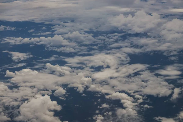 stock image blue sky with cloud closeup,sunlight with blue sky background,image of clear blue sky and white clouds on day time for background usage.