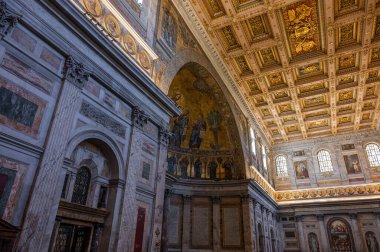 The Papal Basilica of Saint Paul Outside the Walls is one of the four papal basilicas of Rome. It rises along the Via Ostiense, in the district of the same name, near the left bank of the Tiber.