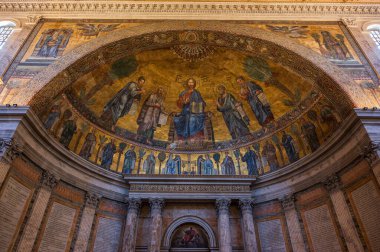 The Papal Basilica of Saint Paul Outside the Walls is one of the four papal basilicas of Rome. It rises along the Via Ostiense, in the district of the same name, near the left bank of the Tiber.