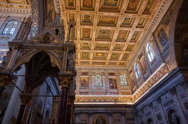 The Papal Basilica of Saint Paul Outside the Walls is one of the four papal basilicas of Rome. It rises along the Via Ostiense, in the district of the same name, near the left bank of the Tiber.