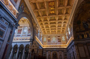 The Papal Basilica of Saint Paul Outside the Walls is one of the four papal basilicas of Rome. It rises along the Via Ostiense, in the district of the same name, near the left bank of the Tiber.
