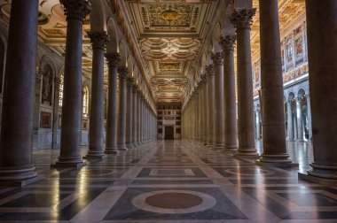 The Papal Basilica of Saint Paul Outside the Walls is one of the four papal basilicas of Rome. It rises along the Via Ostiense, in the district of the same name, near the left bank of the Tiber.