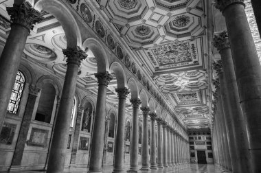 The Papal Basilica of Saint Paul Outside the Walls is one of the four papal basilicas of Rome. It rises along the Via Ostiense, in the district of the same name, near the left bank of the Tiber.