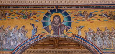 The Papal Basilica of Saint Paul Outside the Walls is one of the four papal basilicas of Rome. It rises along the Via Ostiense, in the district of the same name, near the left bank of the Tiber.