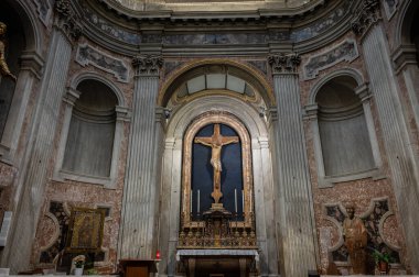 The Papal Basilica of Saint Paul Outside the Walls is one of the four papal basilicas of Rome. It rises along the Via Ostiense, in the district of the same name, near the left bank of the Tiber.