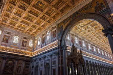 The Papal Basilica of Saint Paul Outside the Walls is one of the four papal basilicas of Rome. It rises along the Via Ostiense, in the district of the same name, near the left bank of the Tiber.