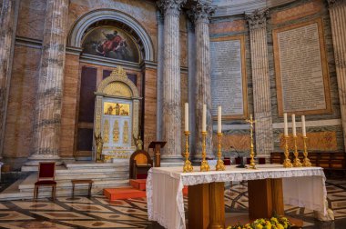 The Papal Basilica of Saint Paul Outside the Walls is one of the four papal basilicas of Rome. It rises along the Via Ostiense, in the district of the same name, near the left bank of the Tiber.
