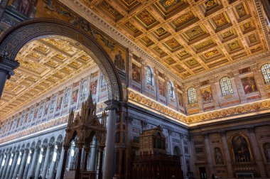 The Papal Basilica of Saint Paul Outside the Walls is one of the four papal basilicas of Rome. It rises along the Via Ostiense, in the district of the same name, near the left bank of the Tiber.