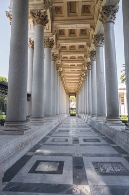 The Papal Basilica of Saint Paul Outside the Walls is one of the four papal basilicas of Rome. It rises along the Via Ostiense, in the district of the same name, near the left bank of the Tiber.