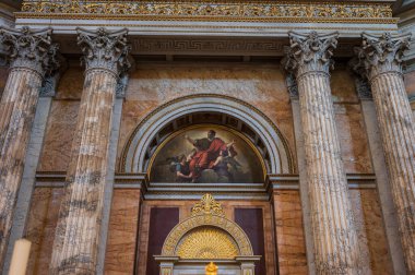 The Papal Basilica of Saint Paul Outside the Walls is one of the four papal basilicas of Rome. It rises along the Via Ostiense, in the district of the same name, near the left bank of the Tiber.