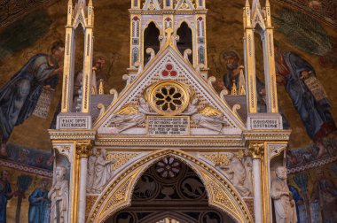 The Papal Basilica of Saint Paul Outside the Walls is one of the four papal basilicas of Rome. It rises along the Via Ostiense, in the district of the same name, near the left bank of the Tiber.