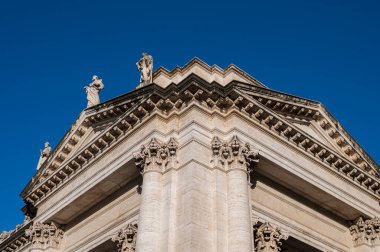 The Papal Basilica of Saint Paul Outside the Walls is one of the four papal basilicas of Rome. It rises along the Via Ostiense, in the district of the same name, near the left bank of the Tiber.