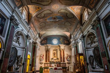 The construction of the Church of San Michele Arcangelo dates back to the 14th century. At the end of the 14th century the Counts of Celano donated it to the congregation of the Celestine monks clipart