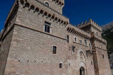 The Piccolomini Castle of Celano overlooks the Fucino plain, once occupied by the third largest lake in Italy, majestically and imposingly. clipart