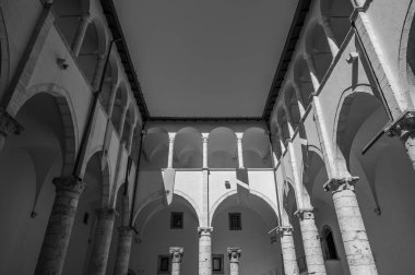 The Piccolomini Castle of Celano overlooks the Fucino plain, once occupied by the third largest lake in Italy, majestically and imposingly. clipart