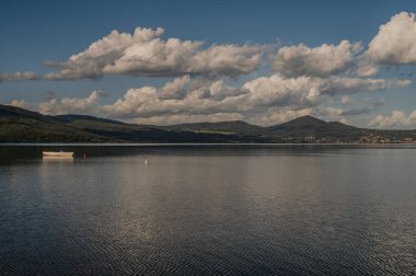 Lake Bracciano, originally called Lake Sabatino, is a lake that fills a depression of volcanic and tectonic origin, located in the Roman Tuscia and surrounded by the Sabatini Mountains. clipart