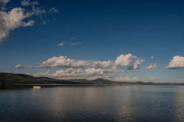 Lake Bracciano, originally called Lake Sabatino, is a lake that fills a depression of volcanic and tectonic origin, located in the Roman Tuscia and surrounded by the Sabatini Mountains. clipart