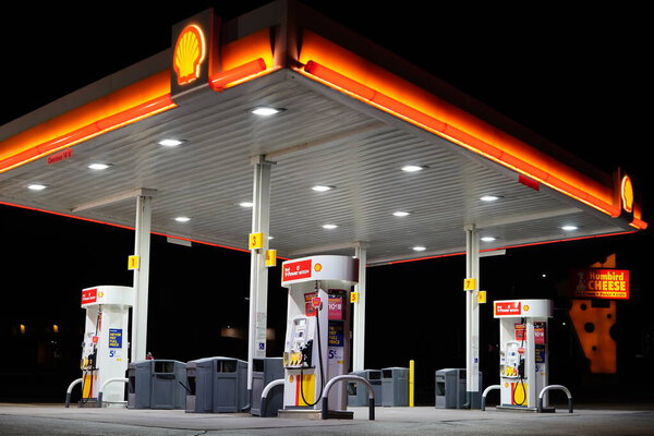 Tomah, Wisconsin USA - April 15th, 2022: Shell fuel station glowing at night.