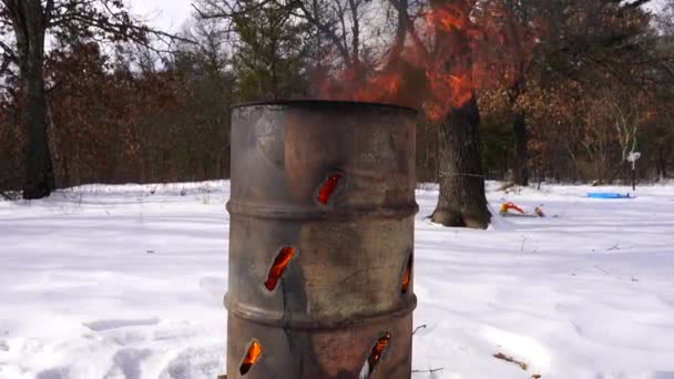 Burning Trash Barrel Sits Cold Winter — Stock Video