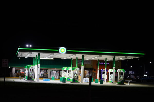 Camp Douglas, Wisconsin USA - September 2nd, 2022: BP British petroleum fuel station lights up the night to serve travelers.