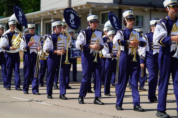 Marshfield, Wisconsin USA - May 29th, 2023: Marching band students of Columbus Catholic High School participate in the Memorial Day parade.