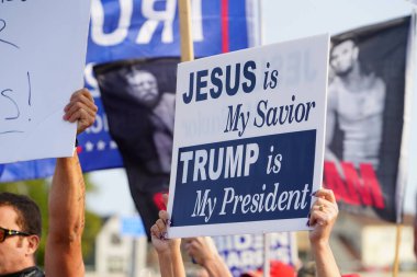 Manitowoc, Wisconsin / USA - September 21th, 2020: President trump and vice president mike pence supporters and joe biden and kamala harris supporters rallied together outside aluminum foundry. clipart