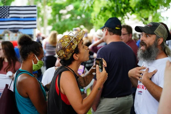 stock image Kenosha, Wisconsin / USA - June 27th, 2020: BLM supporters and antifa engaged in fighting conflict with supporters at blue lives matter rally while local police kept a divide between both sides