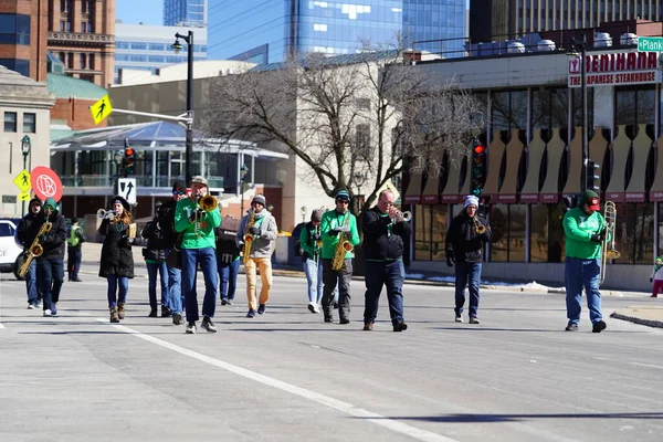 stock image Milwaukee, Wisconsin USA - March 12th, 2022: Irish street band walked and played music in St. Patrick's Day parade.