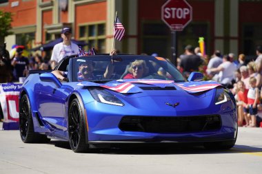 Sheboygan, Wisconsin / USA - July 4th, 2019: Many community members came out to be a spectator and watch 4th of july freedom pride festival parade marching downtown in the city. clipart