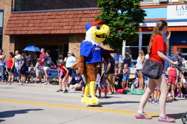 Sheboygan, Wisconsin / USA - July 4th, 2019: Many community members came out to be a spectator and watch 4th of july freedom pride festival parade marching downtown in the city. clipart