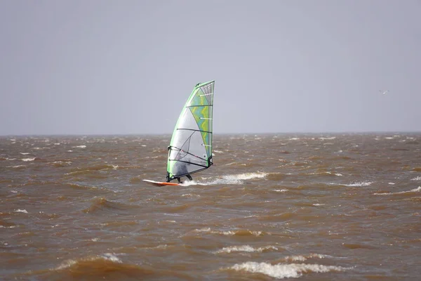 stock image Fond du Lac, Wisconsin, USA - May 3rd, 2020: Locals from Fond du Lac and out of state members enjoyed windsurfing and kitesurfing out on Winnebago Lake went against safer at home coronavirus pandemic