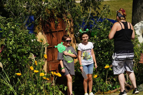 Milwaukee, Wisconsin USA - September 2nd, 2023: Fans of the Shrek Movie dressed up in Shrek character costumes and interacted with each other at the Shrekfest 2023.