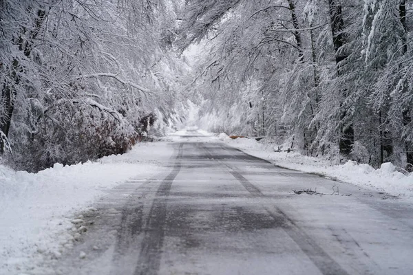 stock image Heavy snow covered road during Wisconsin snow fall of 2022