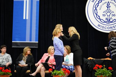  Wisconsin ABD - Wisconsin 'deki Marian Üniversitesi' nde mezuniyet kutlaması, tutkuları eyleme dönüştürme ve ilham verme amaçlı bir eğitim sunan özel bir Katolik Üniversitesi 'dir.