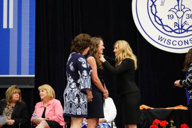  Wisconsin ABD - Wisconsin 'deki Marian Üniversitesi' nde mezuniyet kutlaması, tutkuları eyleme dönüştürme ve ilham verme amaçlı bir eğitim sunan özel bir Katolik Üniversitesi 'dir.