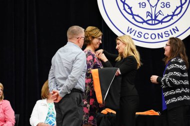  Wisconsin ABD - Wisconsin 'deki Marian Üniversitesi' nde mezuniyet kutlaması, tutkuları eyleme dönüştürme ve ilham verme amaçlı bir eğitim sunan özel bir Katolik Üniversitesi 'dir.