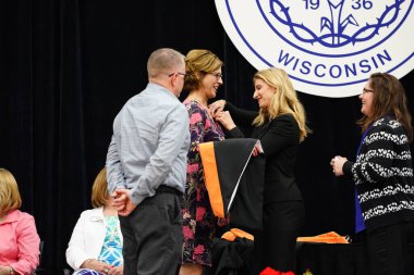  Wisconsin ABD - Wisconsin 'deki Marian Üniversitesi' nde mezuniyet kutlaması, tutkuları eyleme dönüştürme ve ilham verme amaçlı bir eğitim sunan özel bir Katolik Üniversitesi 'dir.