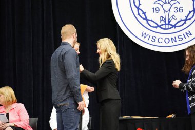  Wisconsin ABD - Wisconsin 'deki Marian Üniversitesi' nde mezuniyet kutlaması, tutkuları eyleme dönüştürme ve ilham verme amaçlı bir eğitim sunan özel bir Katolik Üniversitesi 'dir.