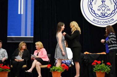  Wisconsin ABD - Wisconsin 'deki Marian Üniversitesi' nde mezuniyet kutlaması, tutkuları eyleme dönüştürme ve ilham verme amaçlı bir eğitim sunan özel bir Katolik Üniversitesi 'dir.