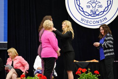  Wisconsin ABD - Wisconsin 'deki Marian Üniversitesi' nde mezuniyet kutlaması, tutkuları eyleme dönüştürme ve ilham verme amaçlı bir eğitim sunan özel bir Katolik Üniversitesi 'dir.