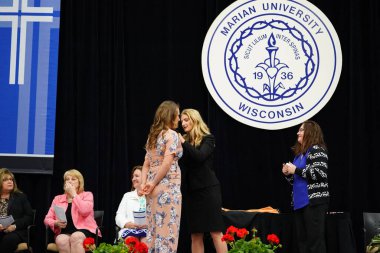  Wisconsin ABD - Wisconsin 'deki Marian Üniversitesi' nde mezuniyet kutlaması, tutkuları eyleme dönüştürme ve ilham verme amaçlı bir eğitim sunan özel bir Katolik Üniversitesi 'dir.