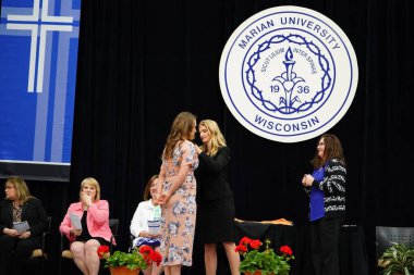  Wisconsin ABD - Wisconsin 'deki Marian Üniversitesi' nde mezuniyet kutlaması, tutkuları eyleme dönüştürme ve ilham verme amaçlı bir eğitim sunan özel bir Katolik Üniversitesi 'dir.