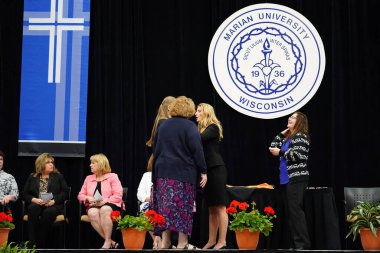  Wisconsin ABD - Wisconsin 'deki Marian Üniversitesi' nde mezuniyet kutlaması, tutkuları eyleme dönüştürme ve ilham verme amaçlı bir eğitim sunan özel bir Katolik Üniversitesi 'dir.