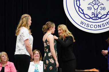  Wisconsin ABD - Wisconsin 'deki Marian Üniversitesi' nde mezuniyet kutlaması, tutkuları eyleme dönüştürme ve ilham verme amaçlı bir eğitim sunan özel bir Katolik Üniversitesi 'dir.