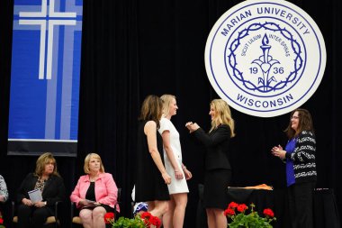  Wisconsin ABD - Wisconsin 'deki Marian Üniversitesi' nde mezuniyet kutlaması, tutkuları eyleme dönüştürme ve ilham verme amaçlı bir eğitim sunan özel bir Katolik Üniversitesi 'dir.