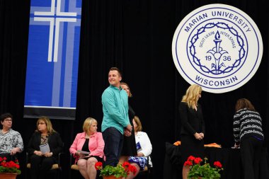  Wisconsin ABD - Wisconsin 'deki Marian Üniversitesi' nde mezuniyet kutlaması, tutkuları eyleme dönüştürme ve ilham verme amaçlı bir eğitim sunan özel bir Katolik Üniversitesi 'dir.