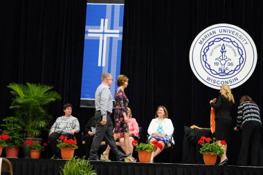  Wisconsin ABD - Wisconsin 'deki Marian Üniversitesi' nde mezuniyet kutlaması, tutkuları eyleme dönüştürme ve ilham verme amaçlı bir eğitim sunan özel bir Katolik Üniversitesi 'dir.